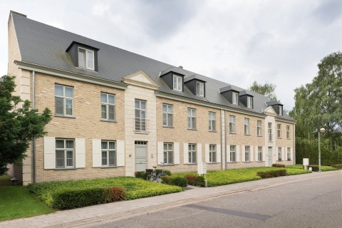 Klassiek appartement in beige gevelsteen gevoegd